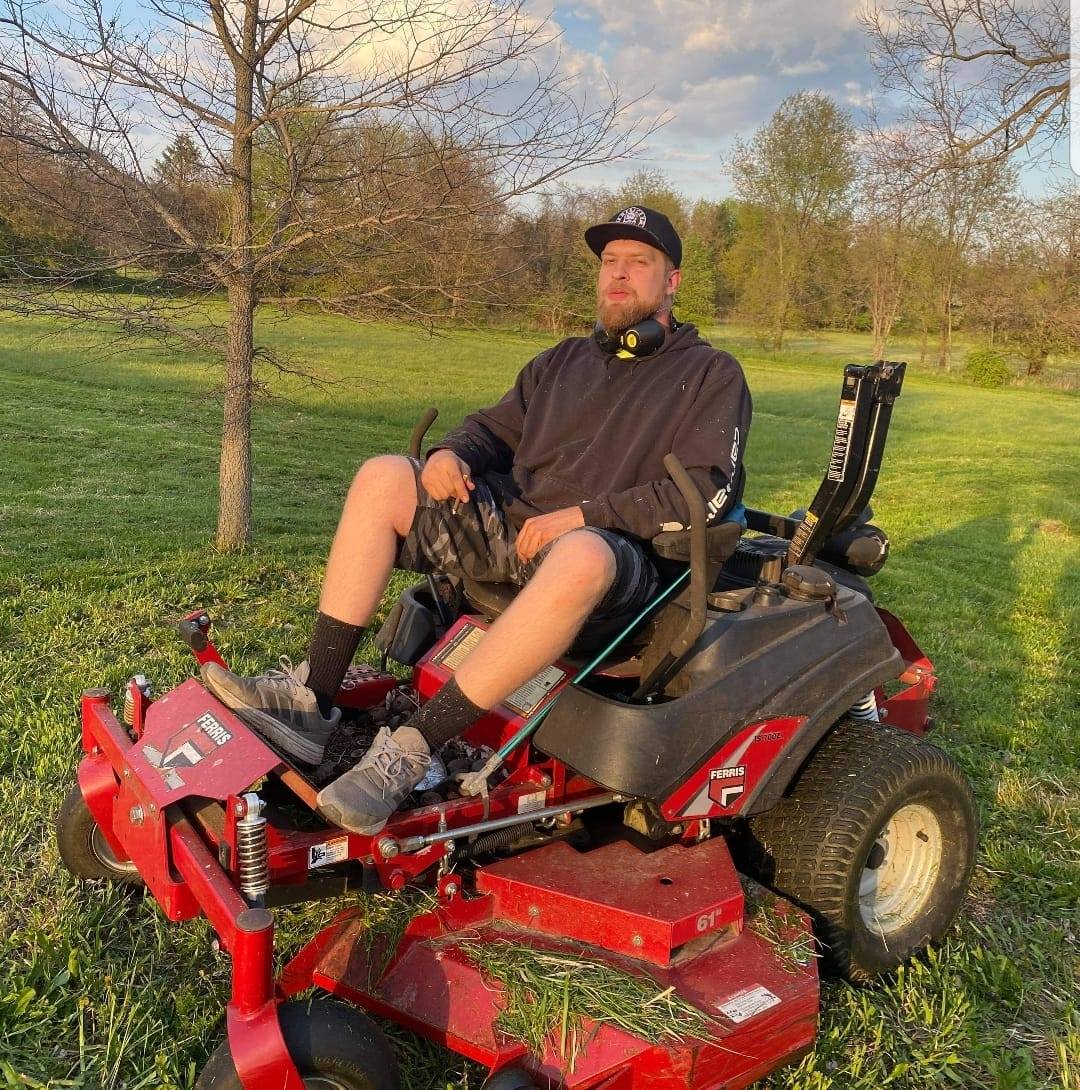 Grandpa Ron's Landscaping | Joshua mowing